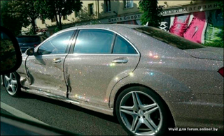 Illustration for article titled How not to hide in plain sight: Â Drive a jewel encrusted Mercedes.